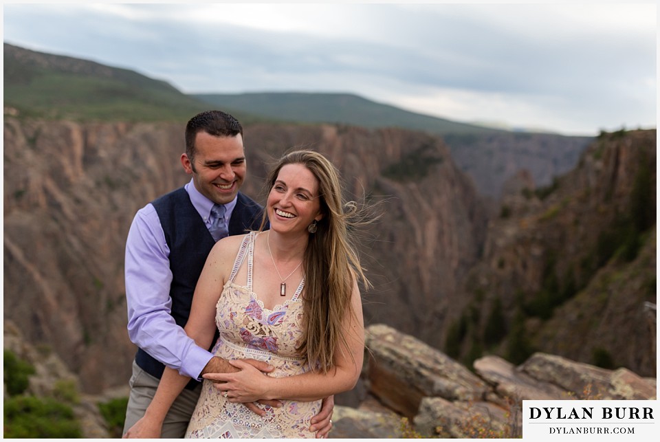 black canyon colorado elopement wedding adventure bride and groom stopping for a laugh