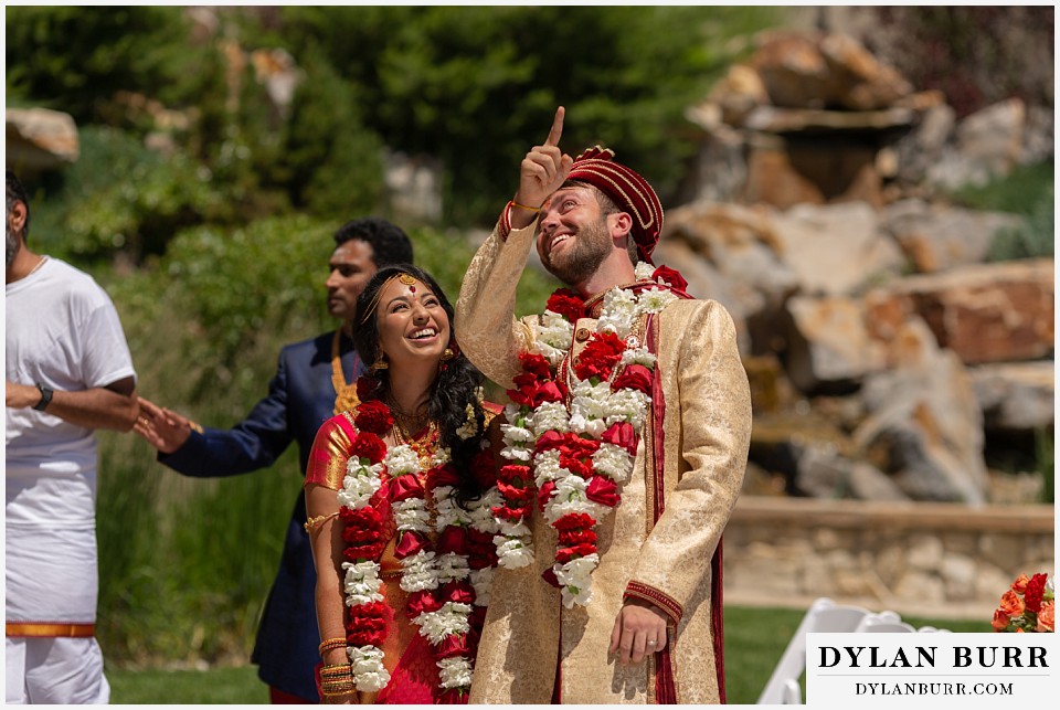 cielo at castle pines wedding colorado mountain wedding groom picking a star in the sky with bride hindu ceremony