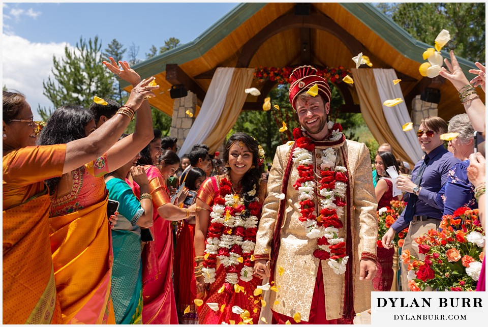 cielo at castle pines wedding colorado mountain wedding overjoyed bride and groom after hindu ceremony