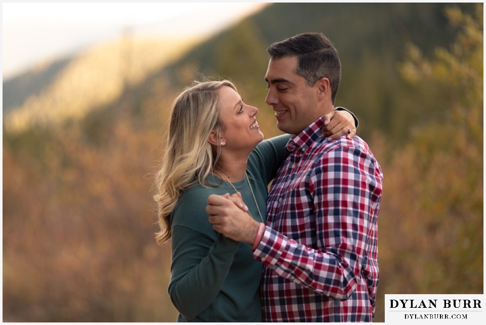 colorado mountain engagement session close up of happy couple
