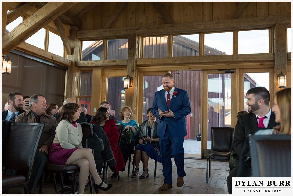devils thumb ranch wedding in winter ceremony timber house
