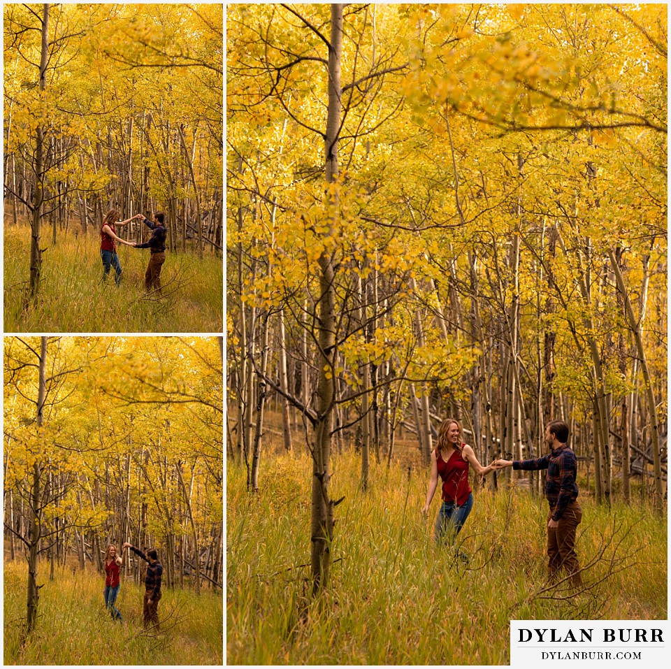 fall engagement photos in colorado couple dancing in aspen grove