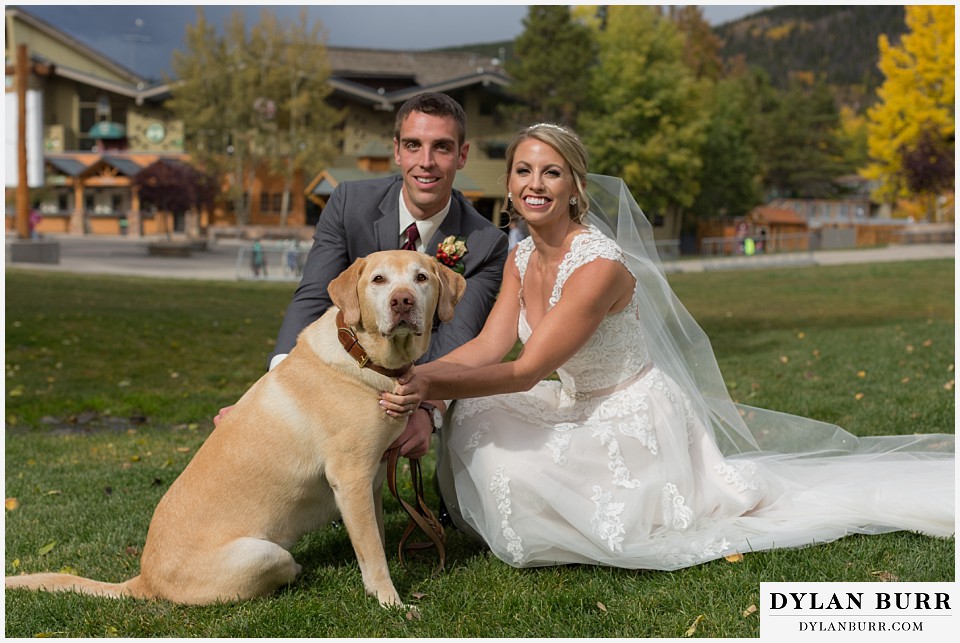 the lodge at sunspot wedding winter park couple with dog