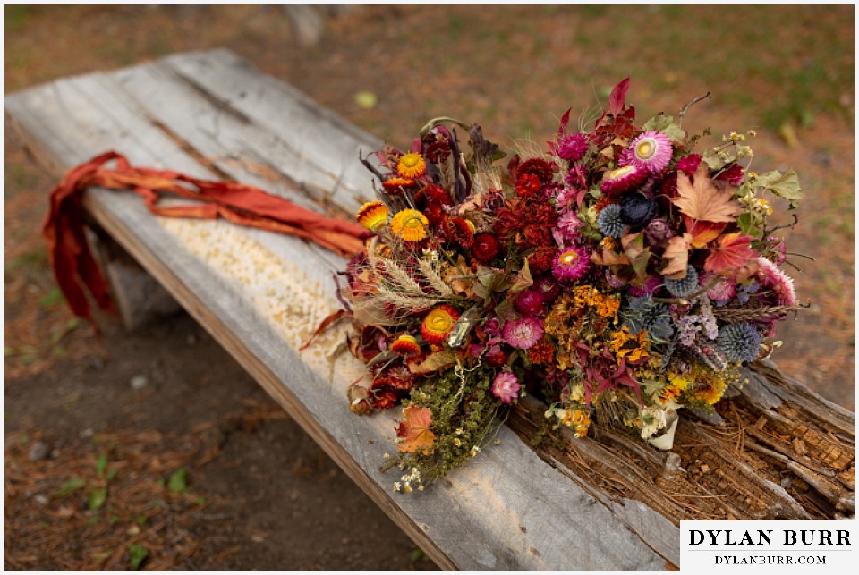 grand lake wedding elopement fall wedding bouquet with dried flowers native corn grasses and wheat