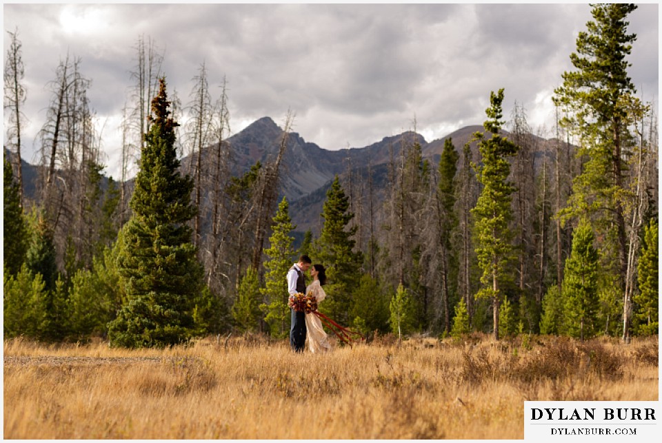 rocky mountain national park grand lake wedding elopement bride and groom sharing a moment in the mountains