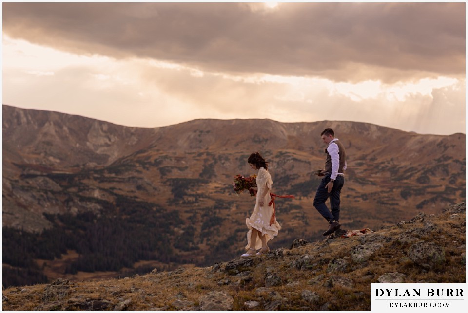 rocky mountain national park grand lake wedding elopement bride and groom walking down to ceremony site