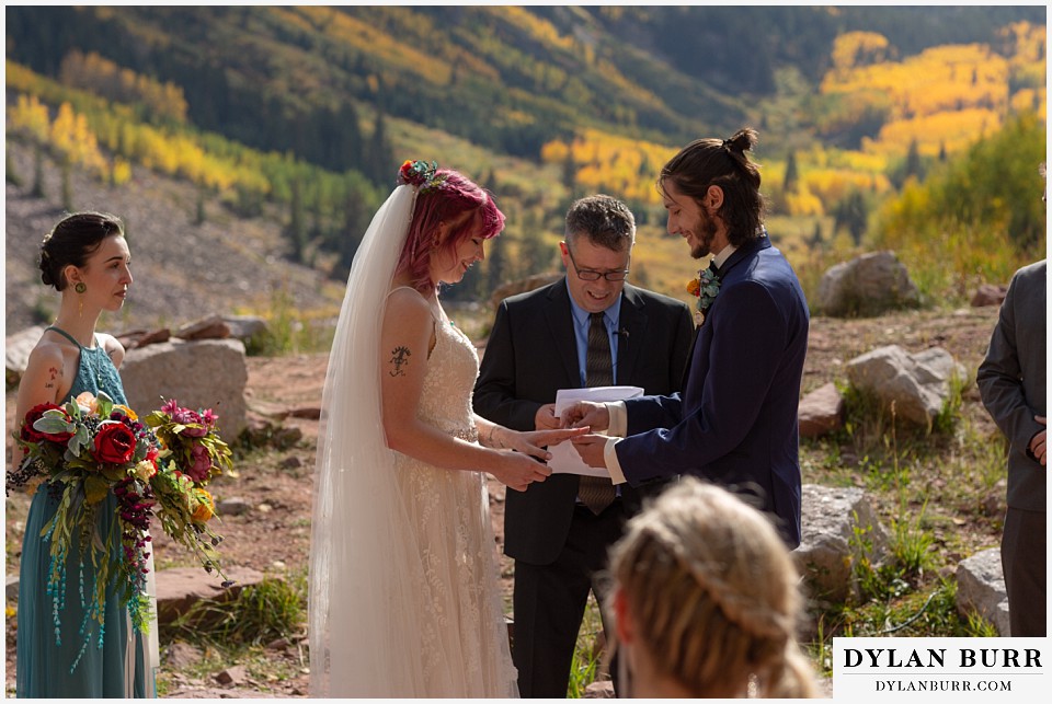 maroon bells wedding aspen colorado mountain wedding exchanging wedding apetite rings