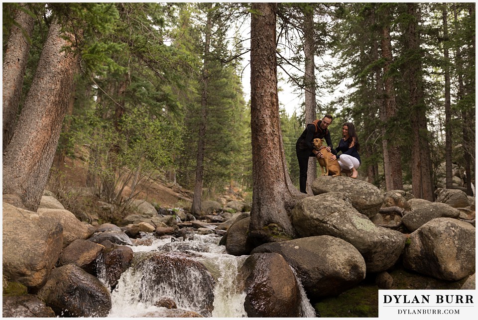 rocky mountain engagement session in colorado river waterfall