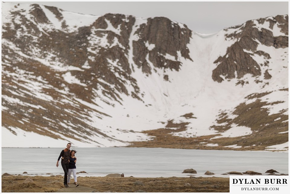 rocky mountain engagement session in colorado snowy mountains and lake
