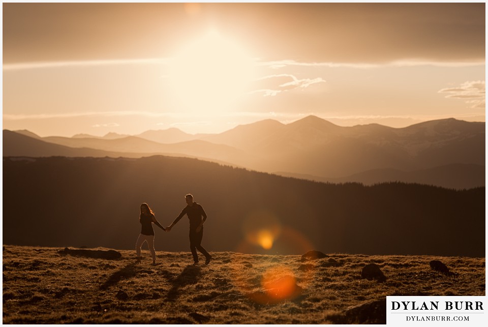 rocky mountain engagement session in colorado huge sunset mountain views