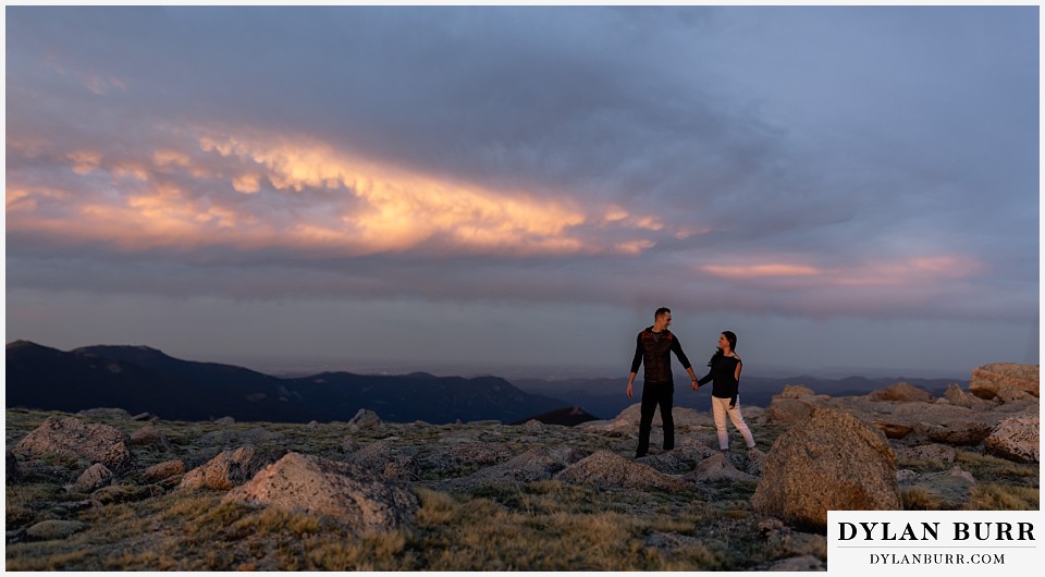 rocky mountain engagement session in colorado sunset panorama hiking in the mountains