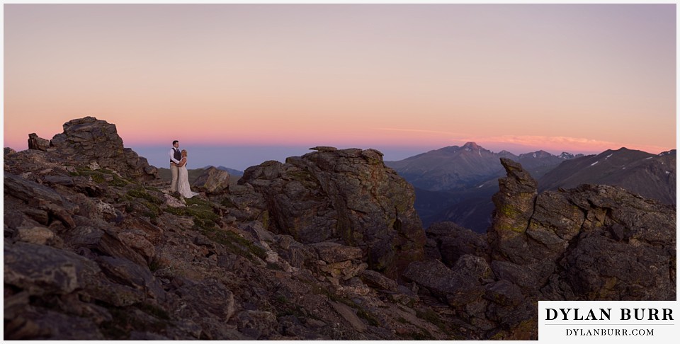 rocky mountain national park wedding elopement bride and groom at sunset on top of the mountains