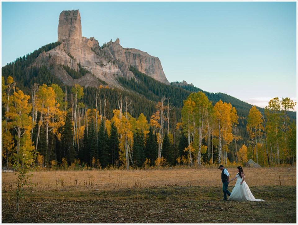 adventure elopement western colorado walking near chimney rock