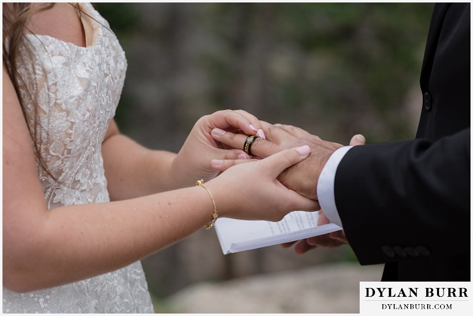 all day elopement in Rocky Mountain National Park exchanging rings