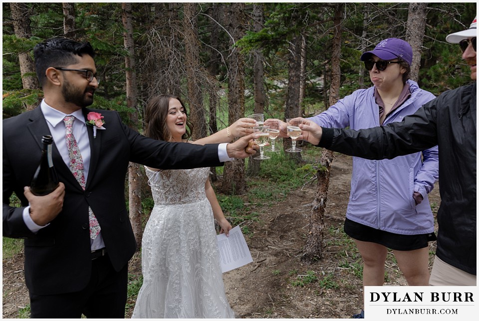 all day elopement in Rocky Mountain National Park champagne toast