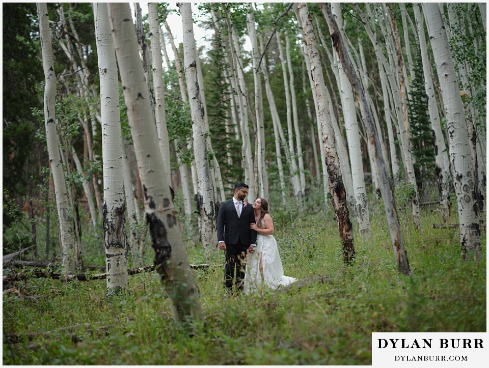 all day elopement in Rocky Mountain National Park couple together in the aspen trees