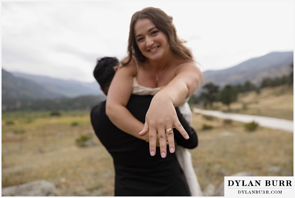all day elopement in Rocky Mountain National Park bride showing off ring