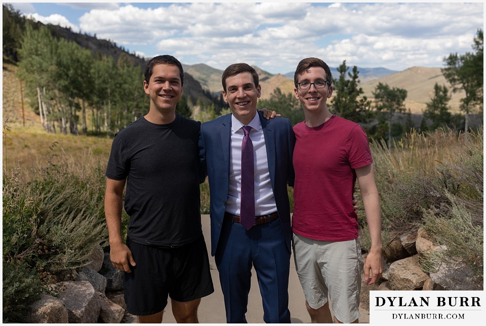 groom with his brother and best man in meadow at antler basin ranch