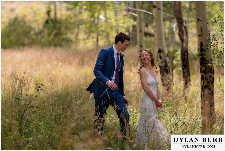 groom comes around to greet bride during first look at antler basin ranch