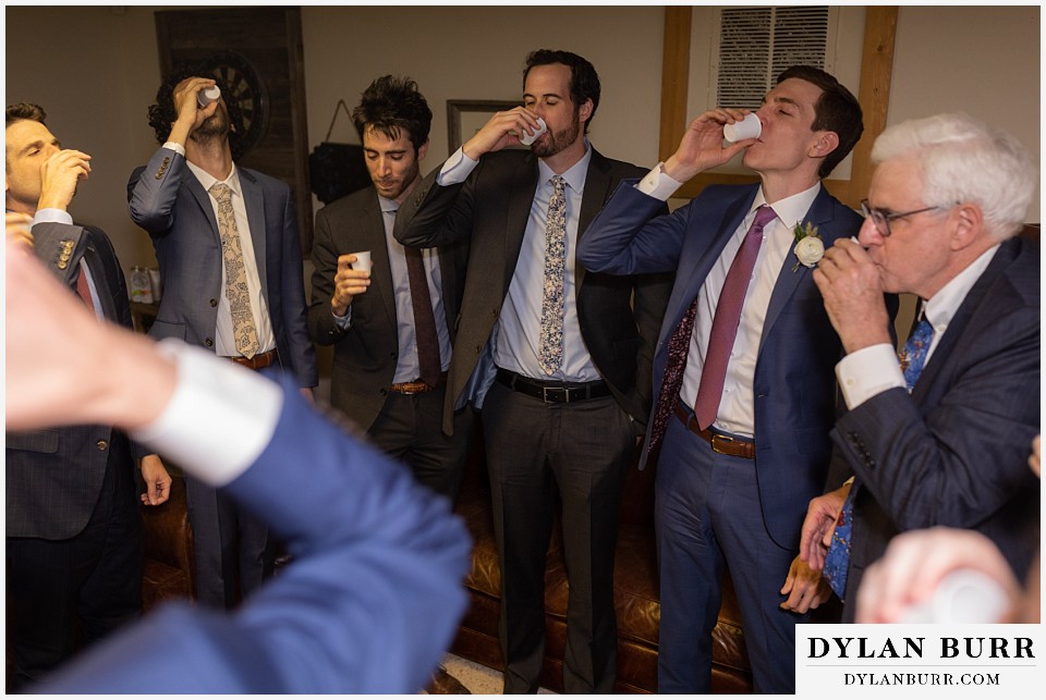 everyone toasting at groom's tisch at antler basin ranch wedding