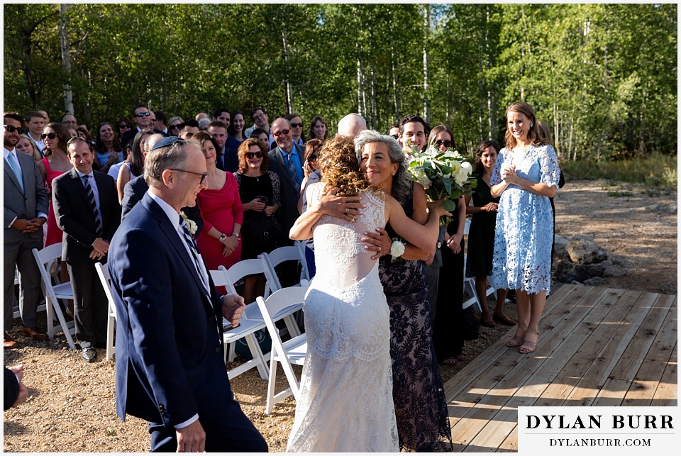 bride hugging mother during Antler Basin Ranch wedding