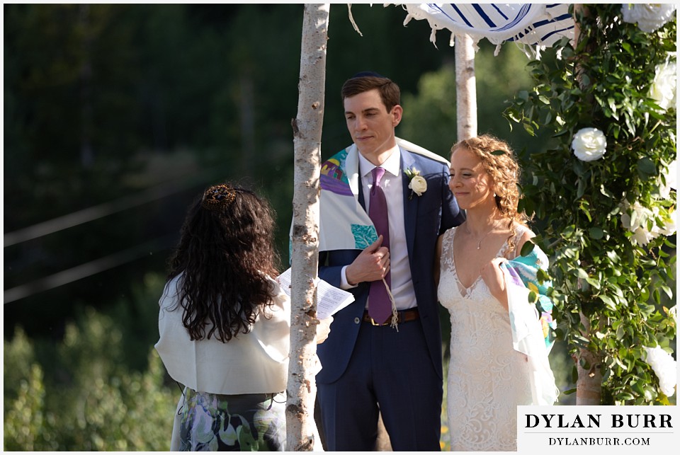 bride and groom wrapped in jewing tallit Antler Basin Ranch wedding