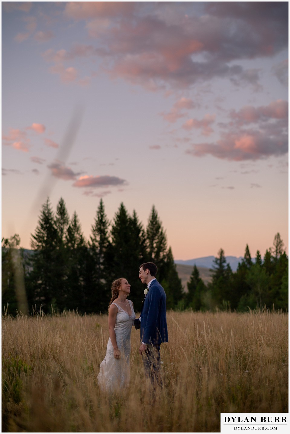 taking a minute to enjoy eachother at sunset at Antler Basin Ranch wedding