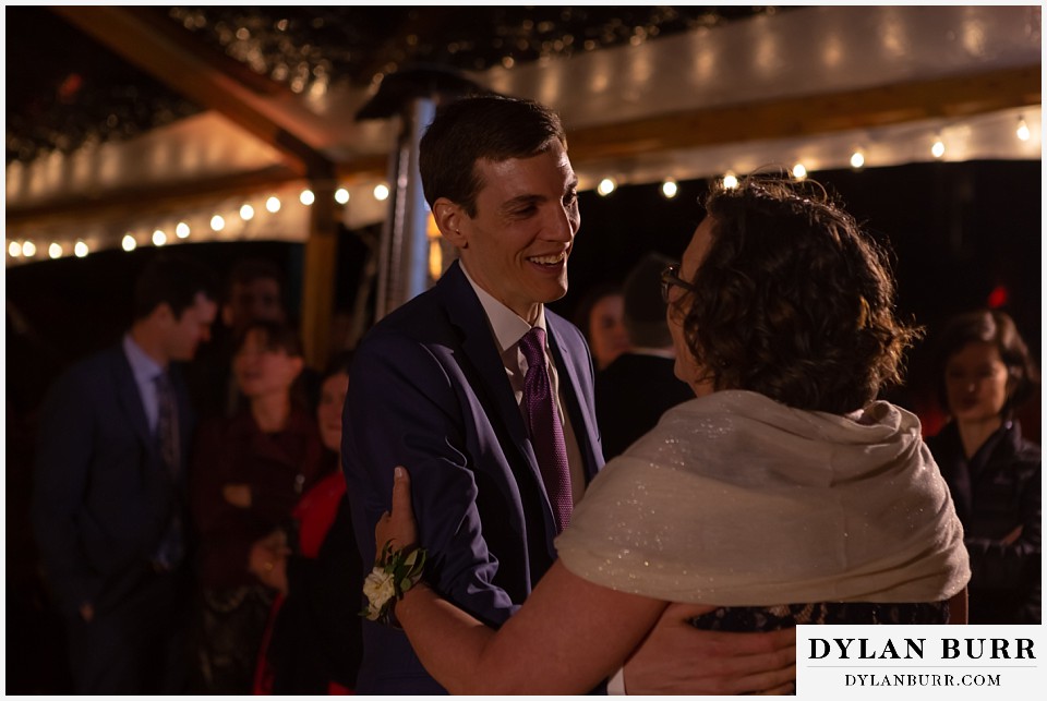 groom dancing with mom during reception Antler Basin Ranch wedding