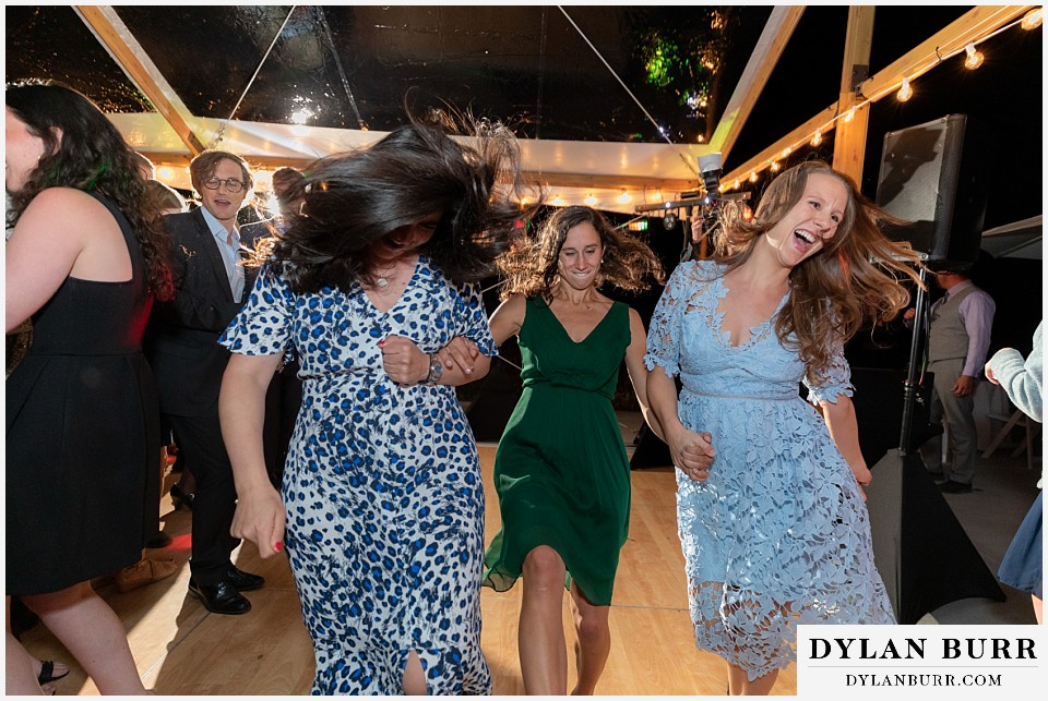 hair flowing while dancing antler basin ranch wedding