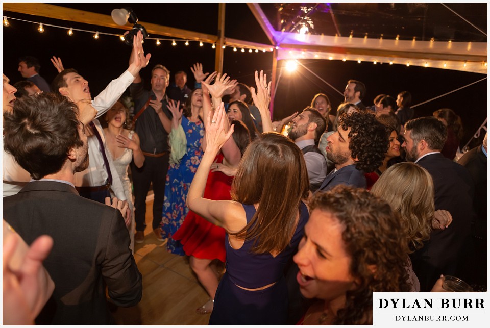 hands up in the air during reception antler basin ranch wedding