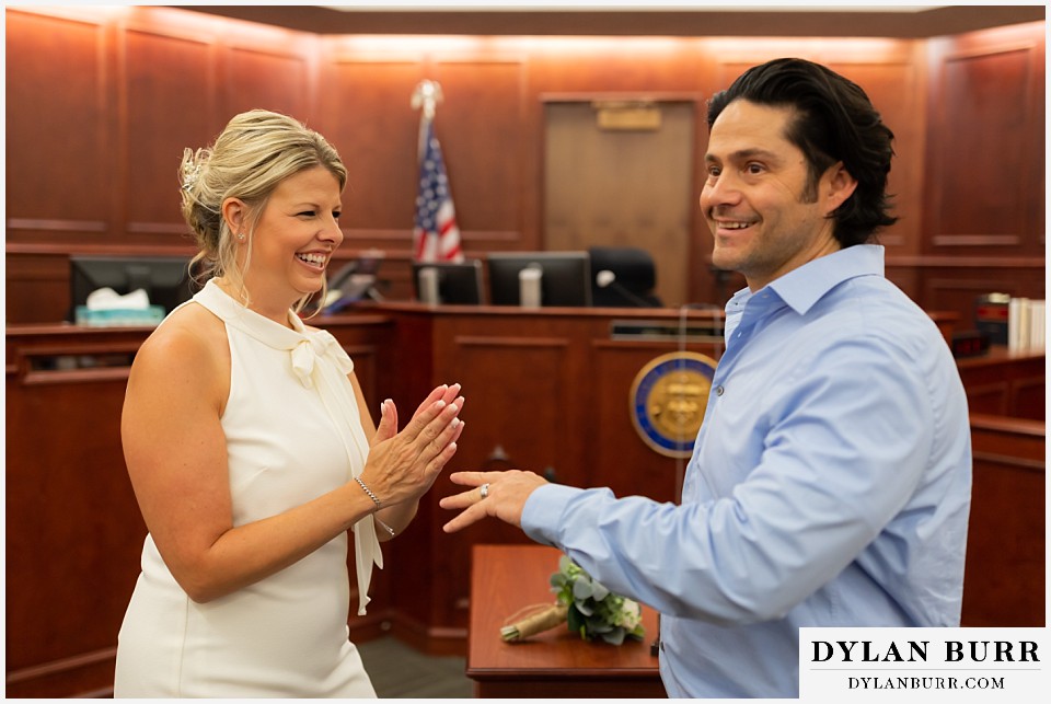 arapahoe county courthouse wedding exchanging rings