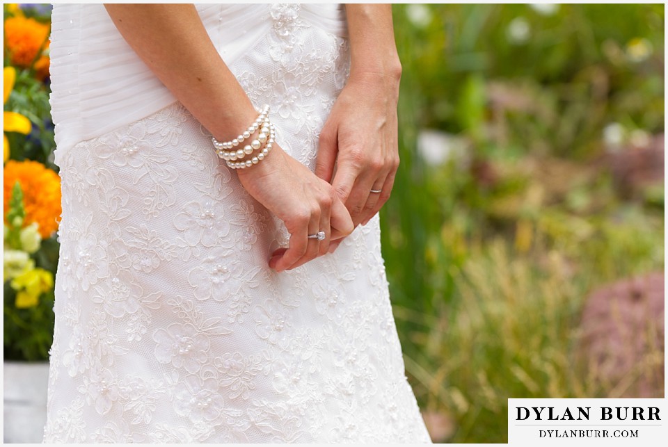 aspen colorado mountain wedding bride and rings with dress