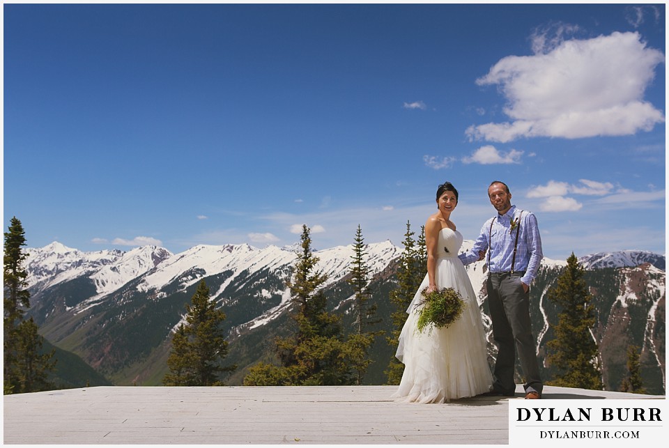 couple on aspen wedding deck