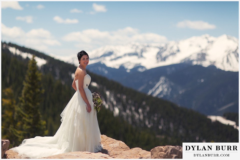 aspen wedding elopement bride looking back on mountain top