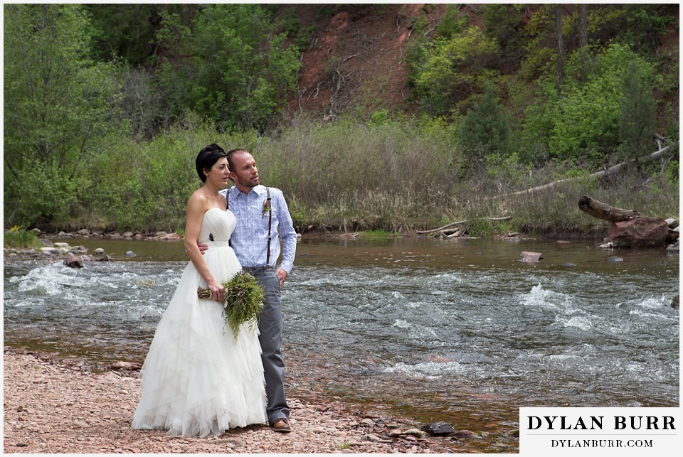 aspen wedding elopement bride and groom walking along river
