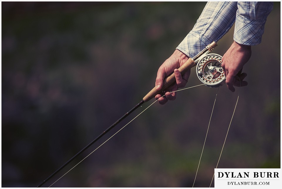aspen wedding elopement groom fly fishing holding line