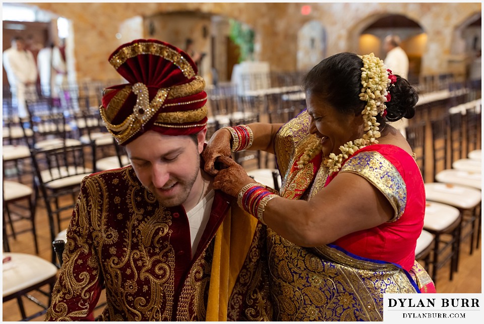 baldoria on the water wedding lakewood colorado hindu wedding brides mother helps groom get ready