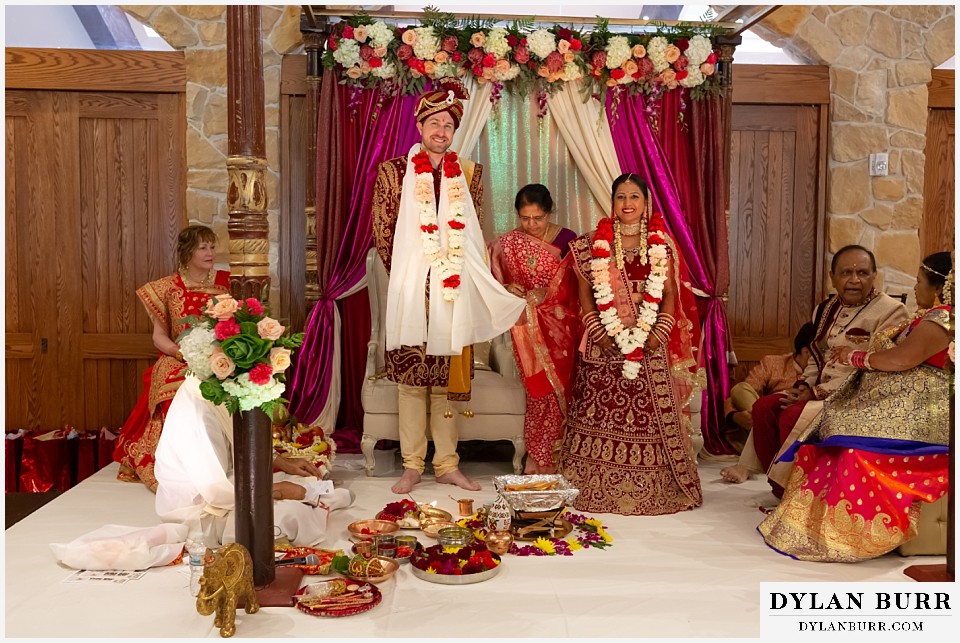 baldoria on the water wedding lakewood colorado hindu wedding bride and groom tied together