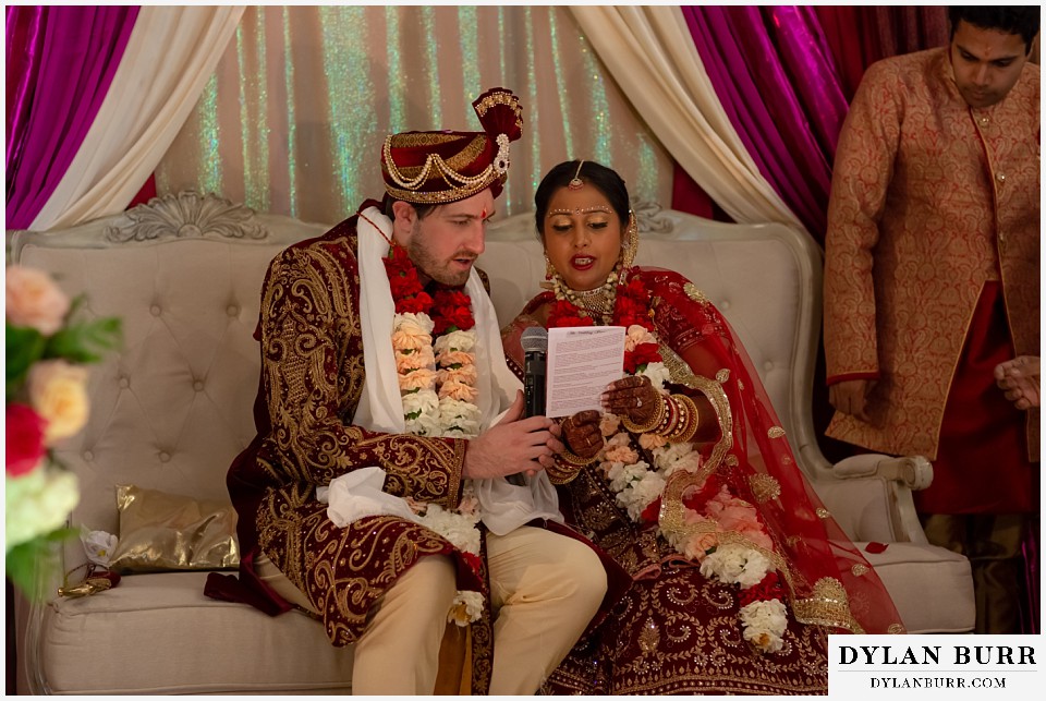 baldoria on the water wedding lakewood colorado hindu wedding reading together during ceremony