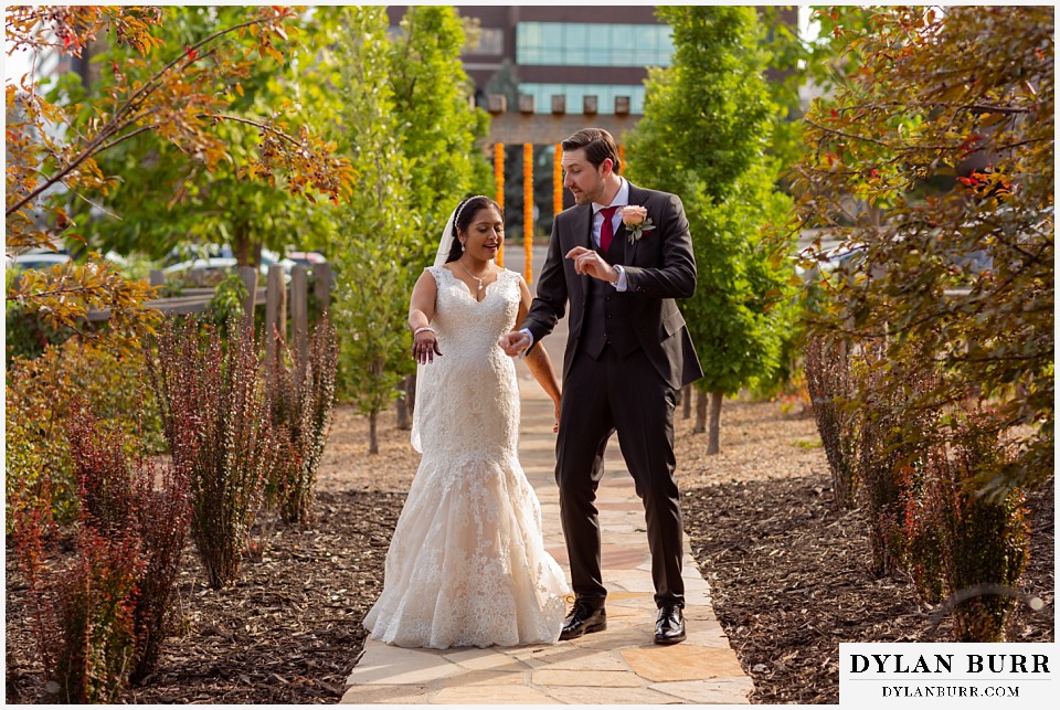 baldoria on the water wedding lakewood colorado hindu wedding bride and groom dancing together