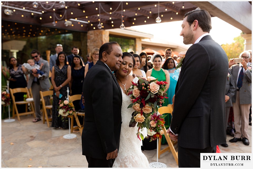 baldoria on the water wedding lakewood colorado hindu wedding bride in aisle with father