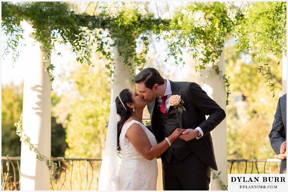 baldoria on the water wedding lakewood colorado hindu wedding first kiss