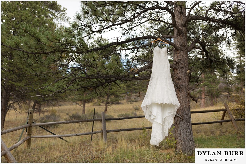 black canyon inn wedding estes park colorado close up detail of wedding dress