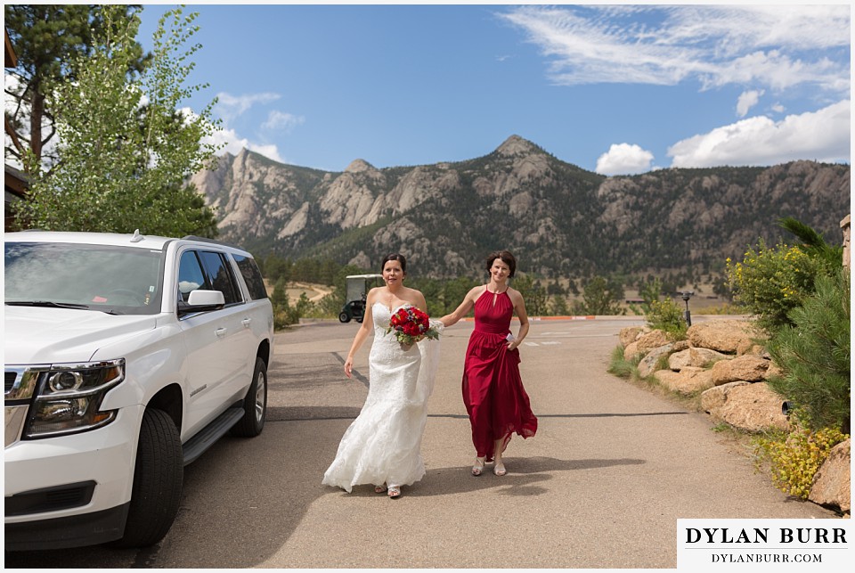 black canyon inn wedding estes park colorado bride walking into ceremony site