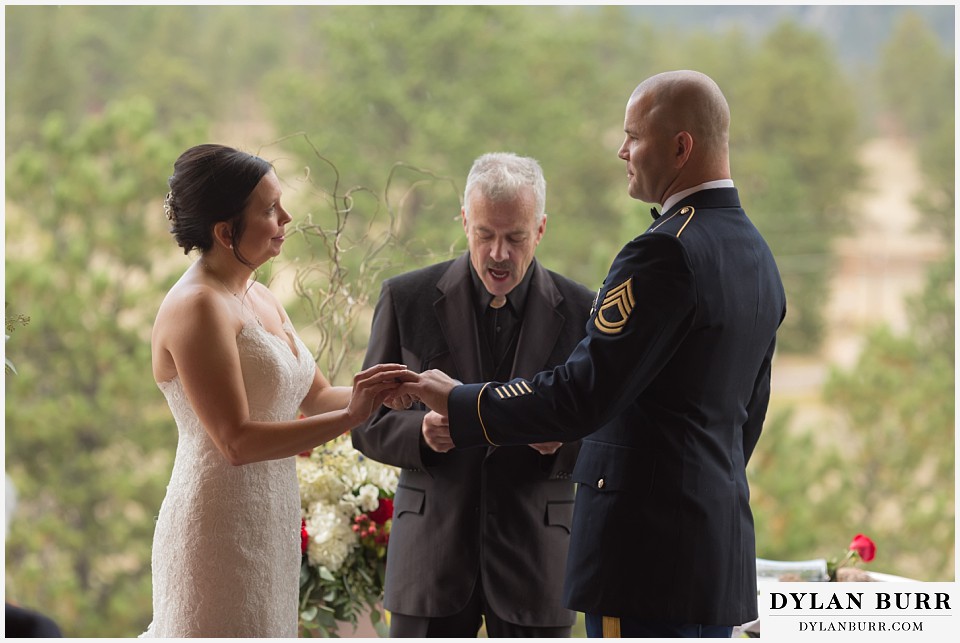 black canyon inn wedding estes park colorado exchanging wedding rings