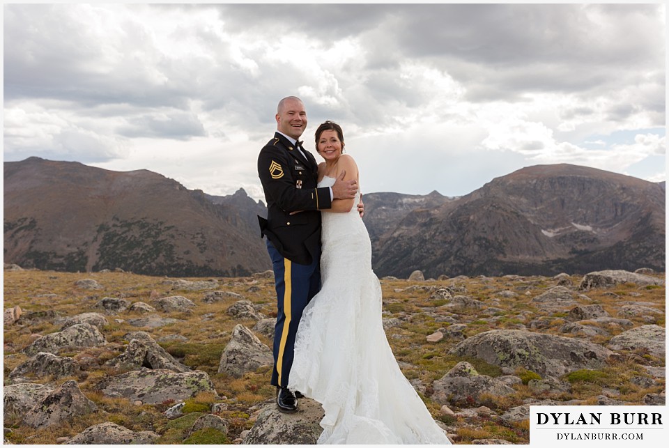 rocky mountain national park wedding colorado bride and groom windblown mountain top