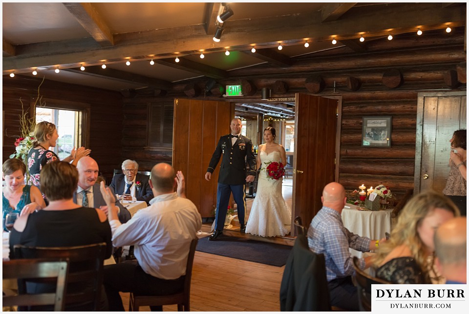 black canyon inn wedding estes park colorado twin owls restaurant wedding couple enters