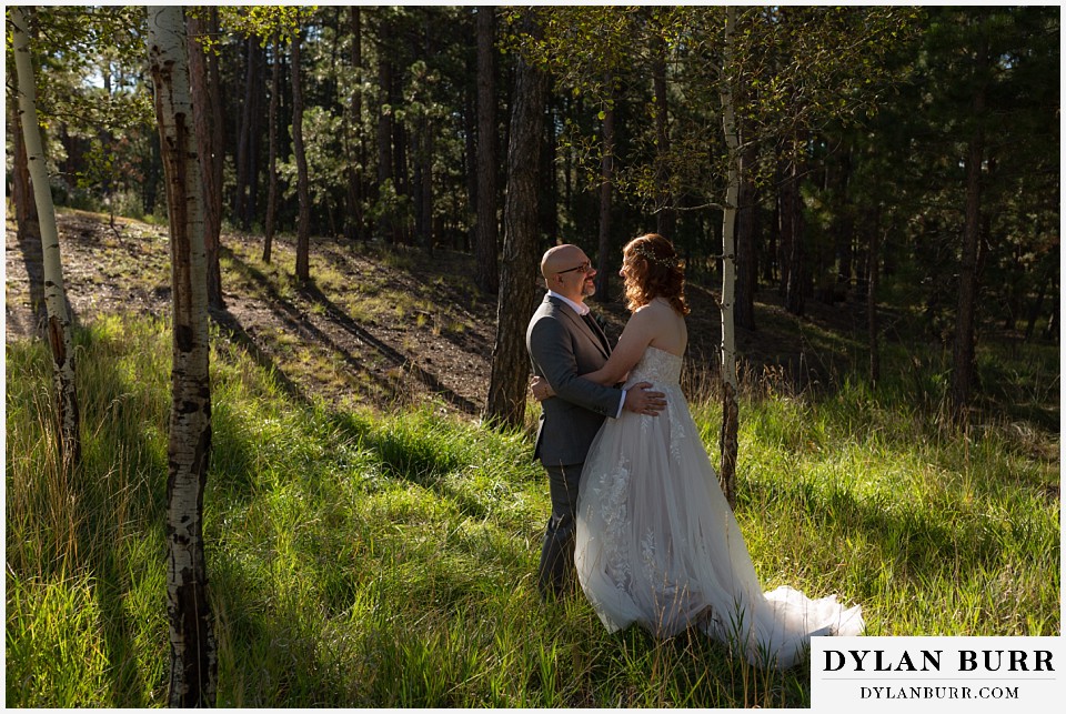 black forest by wedgewood wedding bride and groom first look in the trees