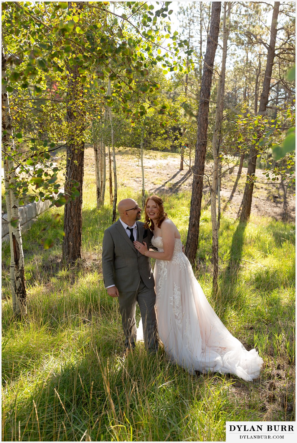 black forest by wedgewood wedding giggly bride and groom in the trees