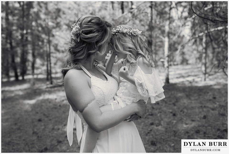 boho backyard colorado wedding talking a calm moment with bride and daughter